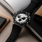 Cornavin Downtown Sport CO.DS.06.R laying on an open book on a desk