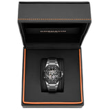 A black and silver Cornavin watch displayed inside an open black presentation box with orange stitching and lining.