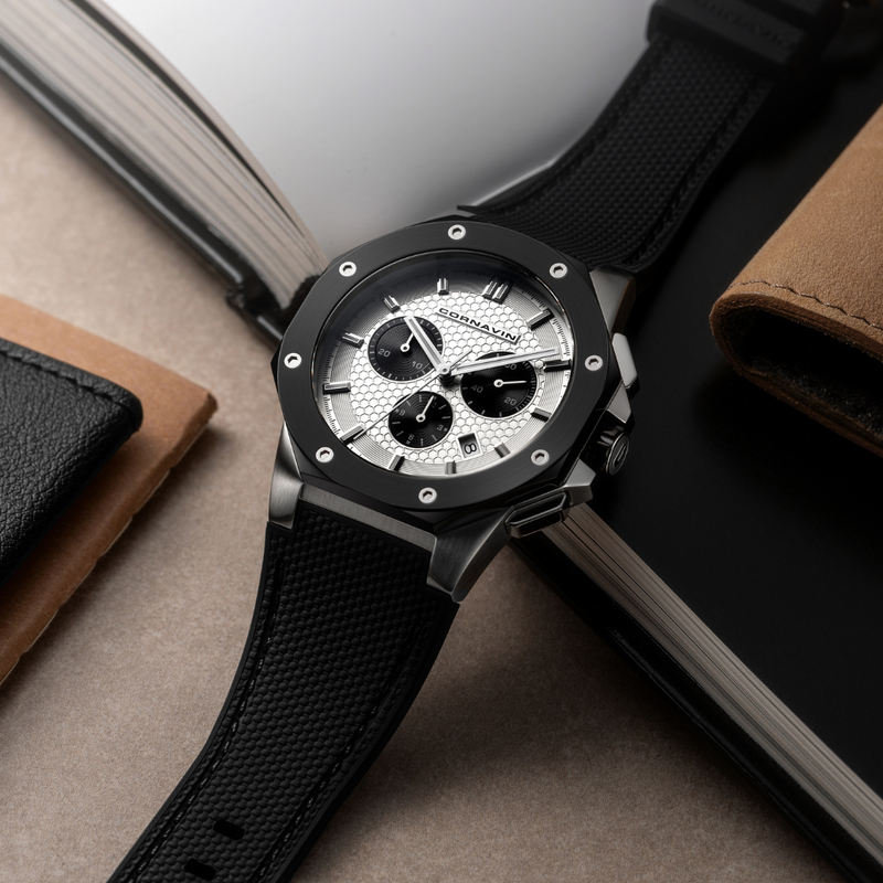 Cornavin Downtown Sport CO.DS.06.R laying on an open book on a desk