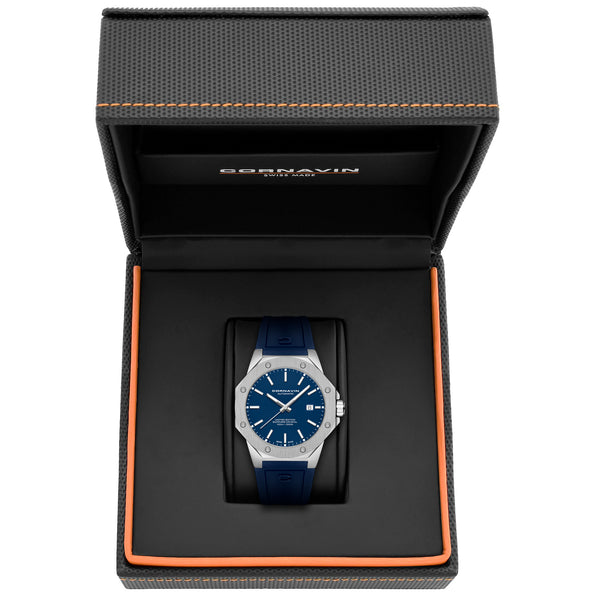 A Cornavin AT.01.R watch with a blue lacquered dial, silver case, and a blue silicone strap.